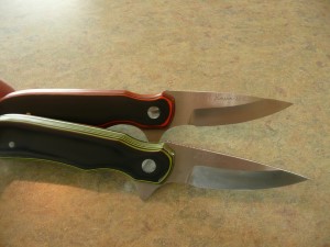 Sling blade knife for gutting
